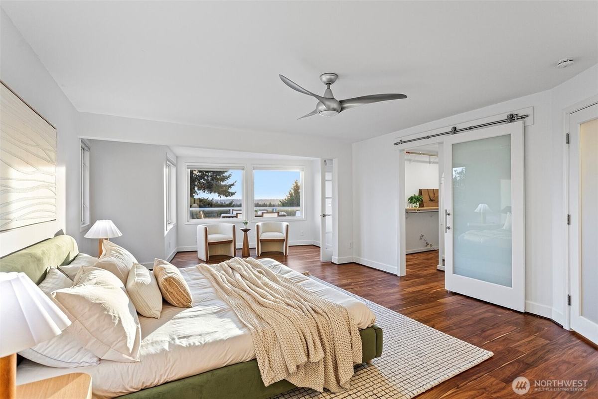 Primary bedroom staged by Top Staging And Design at a home in Bellevue