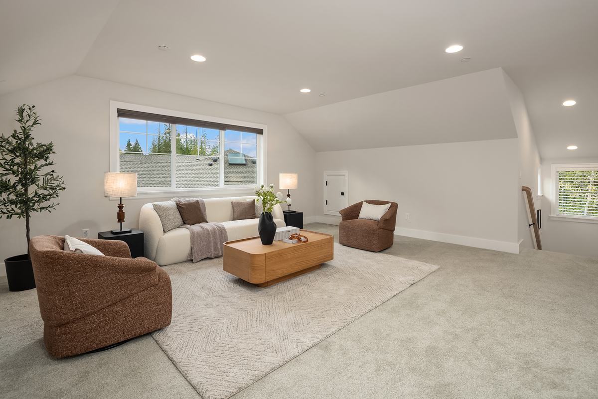 Loft staged by Top Staging And Design at the Sammamish project