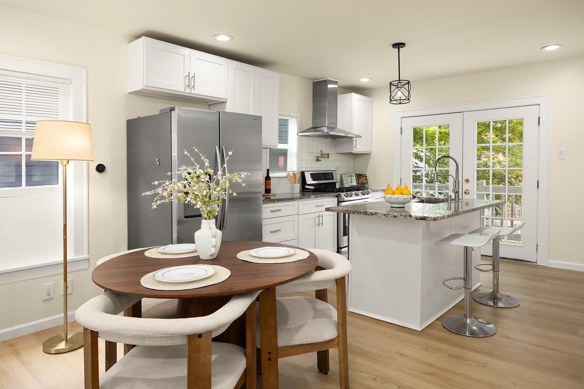 Dining room staged by Top Staging And Design at the North Seattle project