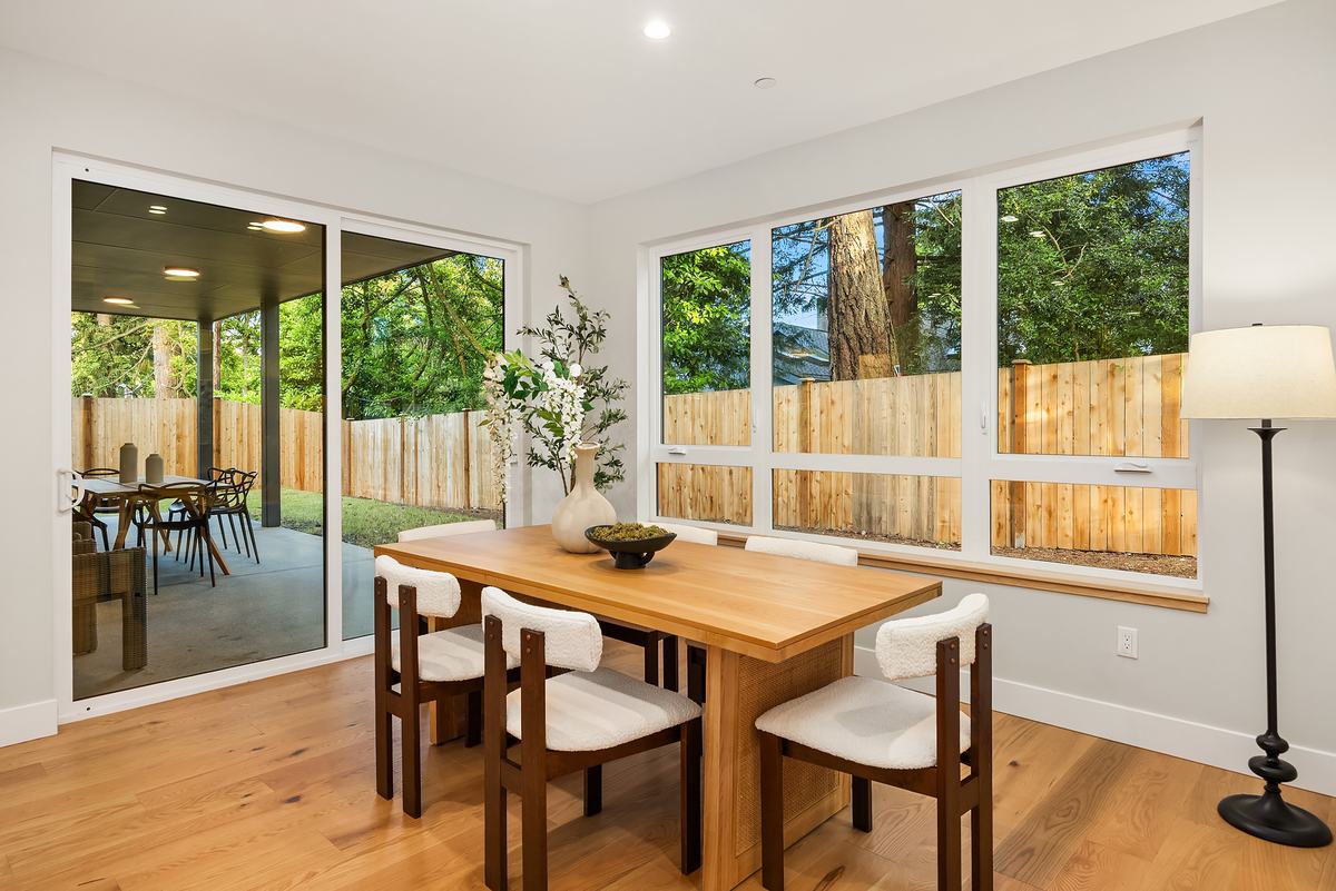 Dining room staged by Top Staging And Design at the Shoreline project