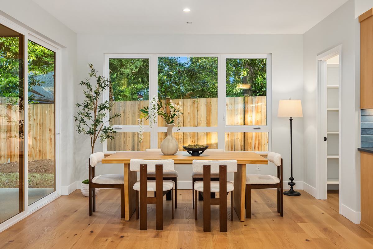 Dining room staged by Top Staging And Design at the Shoreline project